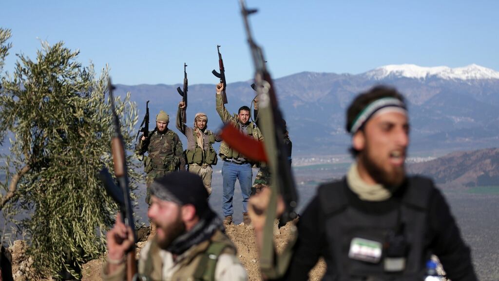 Turkish-backed Free Syrian Army fighters near the city of Afrin, Syria, on Monday. Photograph: Khalil Ashawi/Reuters