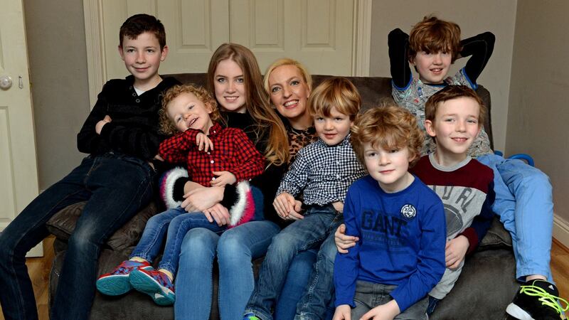 Jen Hogan with her daughter Chloe and sons, from left, Adam, Noah, Zach, Tobey, Luke and Jamie. Photograph: Cyril Byrne