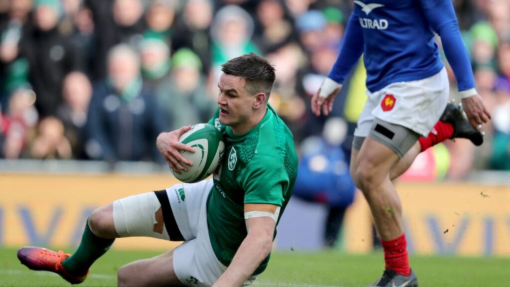 Ireland’s Jonathan Sexton goes over to score a try in the Six Nations game against France. Photograph: Dan Sheridan/Inpho