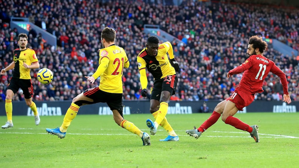 Liverpool’s Mohamed Salah scores his side’s first goal against Watford. Photograph: Peter Byrne/PA Wire.