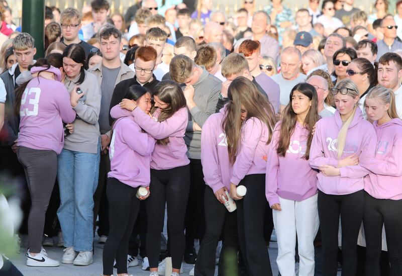 Emotional scenes at the vigil for the four young people who died on Friday night. Photograph: Garrett White/Collins