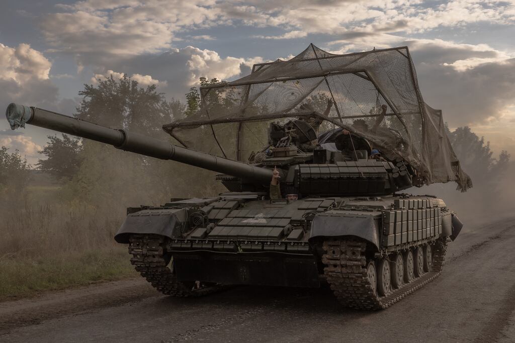 Ukrainian servicemen drive a Soviet-made T-64 tank in the Sumy region, near the border with Russia, on Sunday. Photograph: Roman Pilipey/AFP via Getty Images