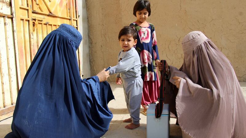 Afghan health workers administer polio vaccination to children in Kandahar, Afghanistan on October 15th, 2019. Photograph: Muhammad Sadiq/EPA/