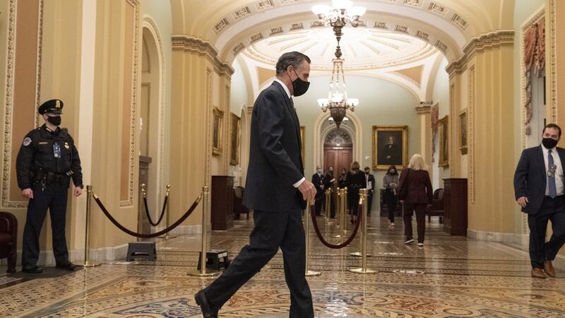 Republican senator Mitt Romney walks through the US Capitol on Friday as the Trump impeachment trial continued. Photograph: Chris Kleponis/CNP/Bloomberg