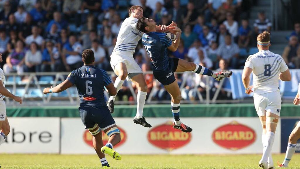 Leinster’s Zane Kirchner challenges for the ball with Castres’ Geoffrey Palis during the European Rugby Champions Cup match at Stade Pierre Antoine. Photograph: Billy Stickland/Inpho