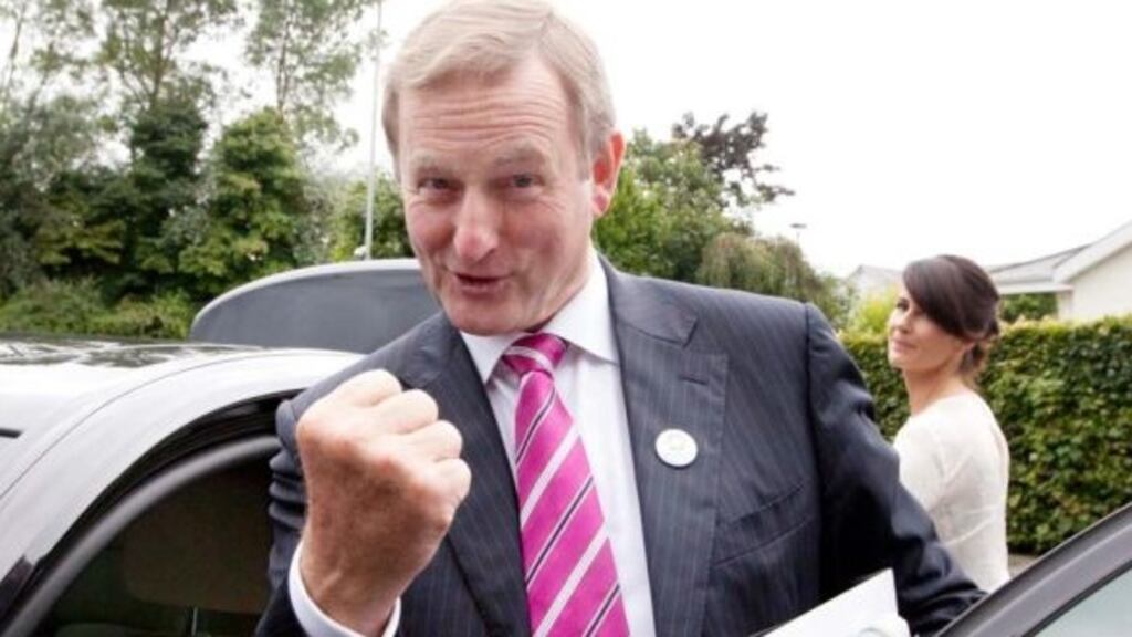 Taoiseach Enda Kenny, who said in a radio interview earlier this week that he “got his mojo back”, gets into a car after the Fine Gael think-in at Newbridge, Co Kildare. Photograph: Eamonn Farrell/Rollingnews.ie