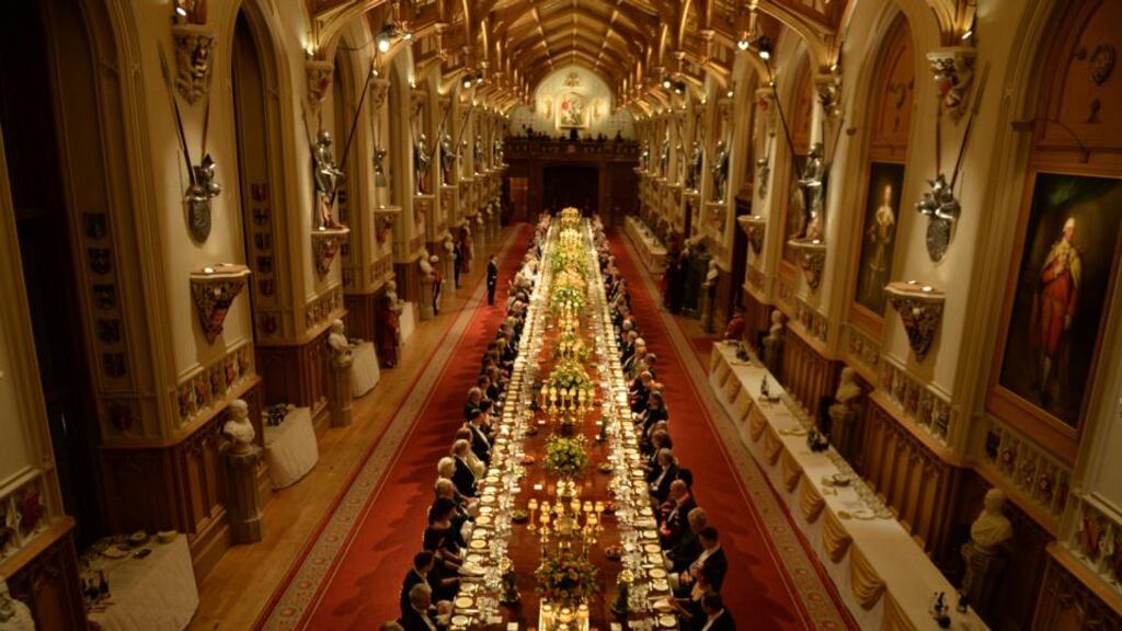 ‘There is an island in the south Pacific whose people adhere to a cargo cult and – so it’s said – regard the queen’s husband as a god. We are not there yet, but it’s early days.’ Above, the banquet held at Windsor Castle during the State visit of President Higgins. Photograph: Alan Betson
