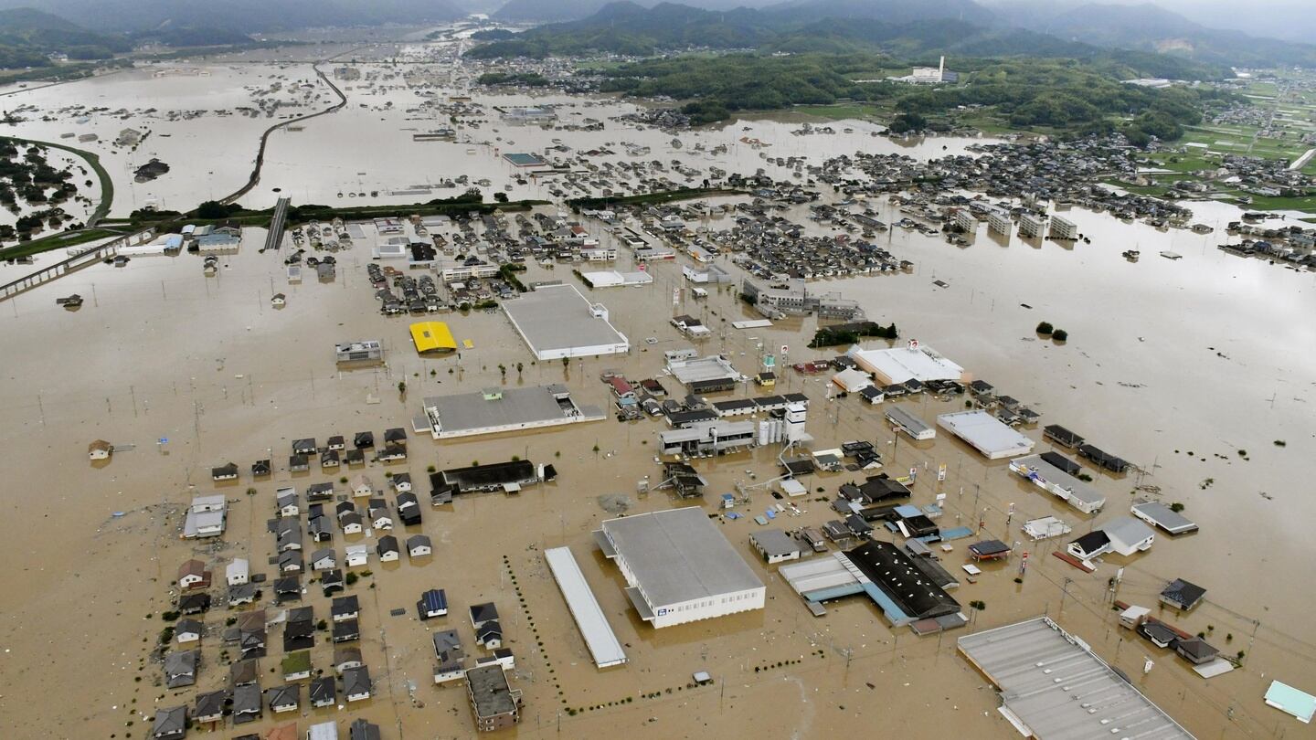 An aerial view shows submerged houses and facilities in a flooded area in Kurashiki, southern Japan. Photograph: Reuters