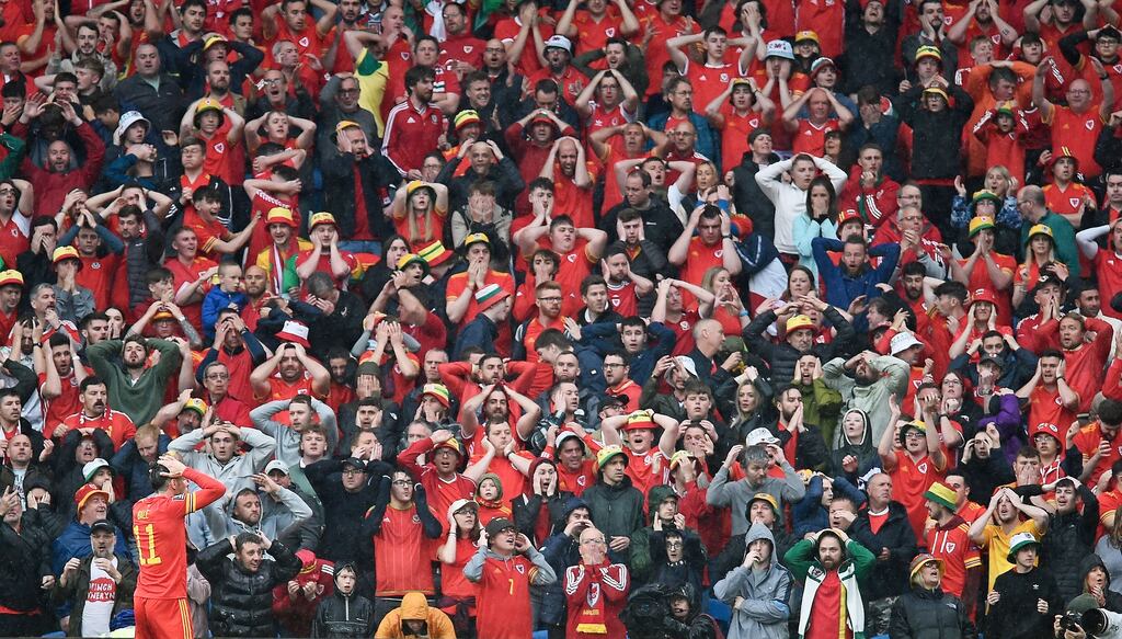 Welsh fans react as Wales' Gareth Bale gestures during the World Cup qualification playoff final in Cardiff. Photograph: Peter Powell/EPA