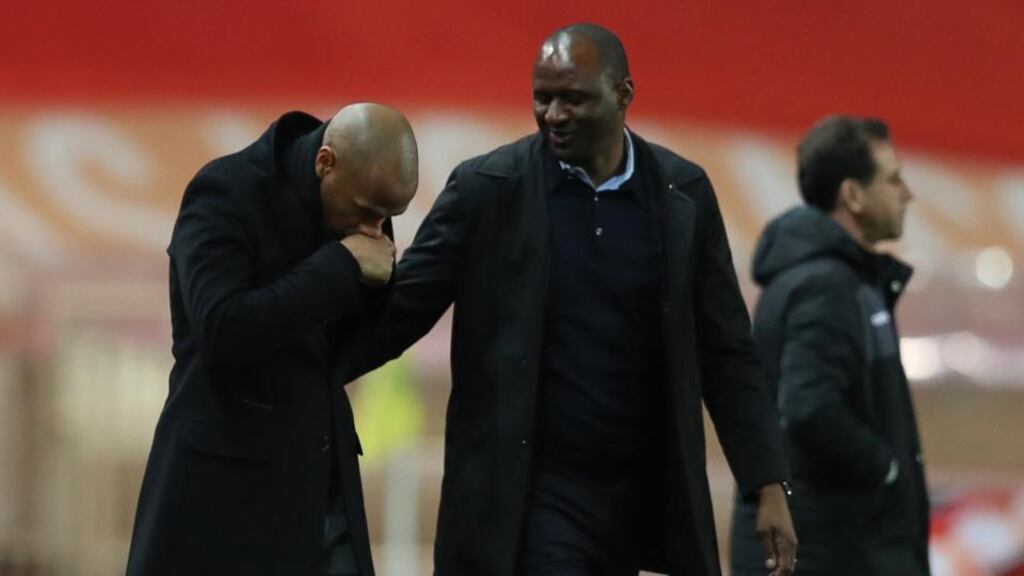 Monaco’s coach Thierry Henry and Nice’s coach Patrick Vieira react at the end of the French Ligue 1 match between Monaco and Nice at the Stade Louis II on Wednesday.Photograph: Valery Hache/AFP/Getty Images