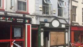 Father saved lives of four others before dying in fire with son, mourners told