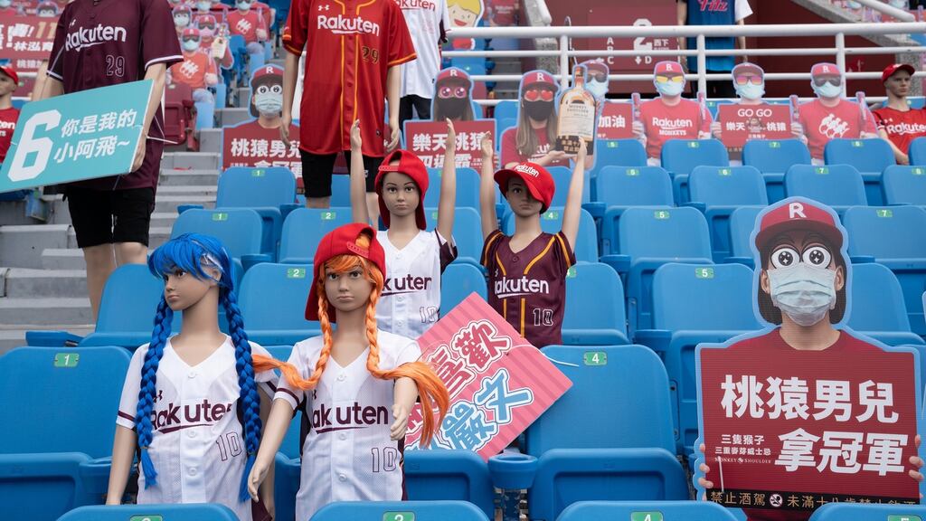 Dummies and cardboard cut-outs replace fans during a game between the Rakuten Monkeys and the CTBC Brothers at Taoyuan International Baseball Stadium in Taiwan on Saturday. Photograph: Ashley Pon/The New York Times