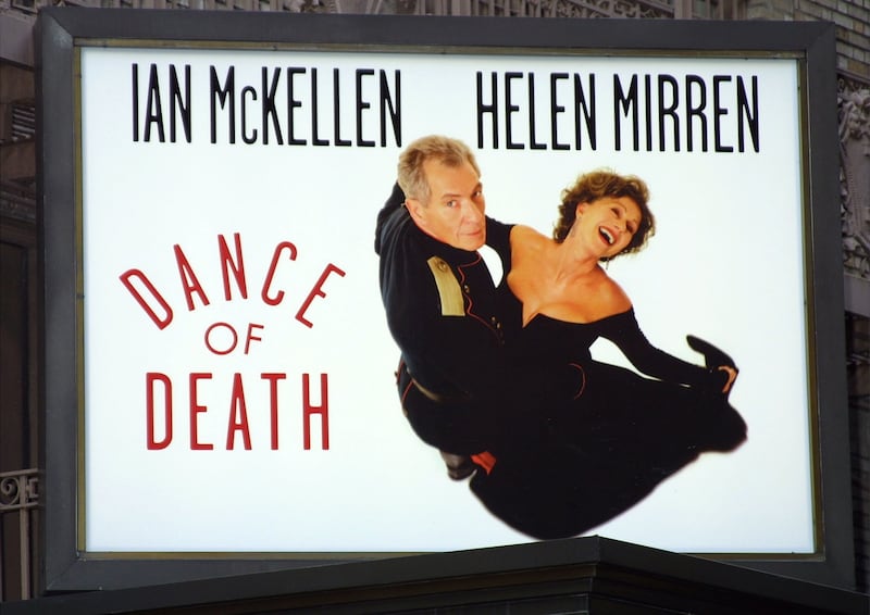 Photos of Ian McKellen and Helen Mirren grace the marquee for the Broadway play “Dance of Death” September 18, 2001 in New York City as the show opened to preview audiences. Photograph: George De Sota/Getty Images