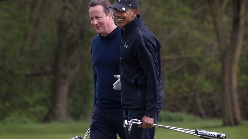 Prime minister David Cameron and president Barack Obama on the links together at The Grove, a golf course in Watford, England. Photograph: Stephen Crowley/The New York Times