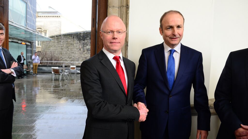 Joining Fianna Fáil: Stephen Donnelly with party leader    Micheál Martin  last week. Photograph: Dara Mac Dónaill
