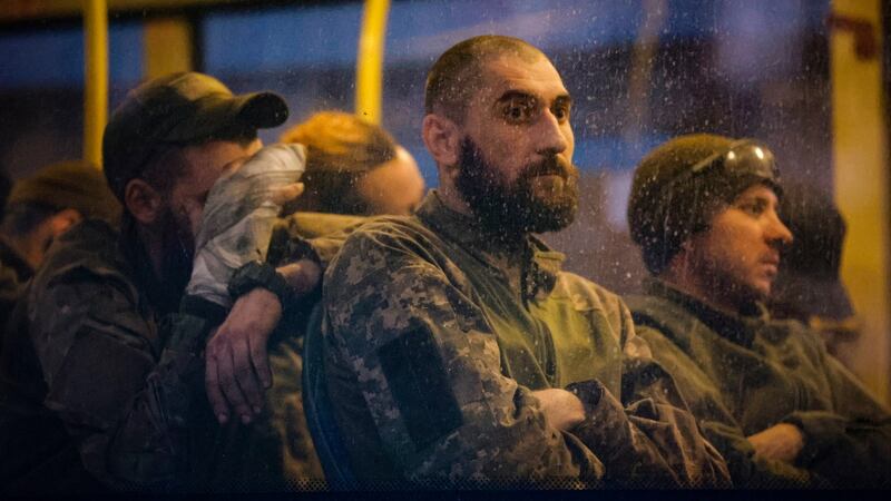 Ukrainian servicemen sitting in a bus after their surrender to Russian forces and evacuation from the besieged Azovstal steel plant in Mariupol on May 17th, 2022. Photograph: Alessandro Guerra/EPA