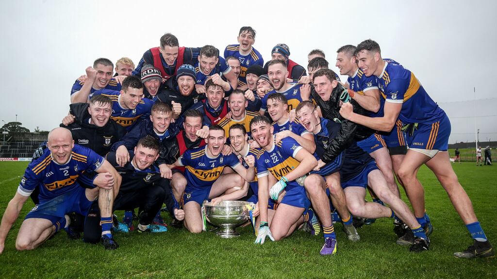 Ratoath celebrate with the Meath senior football trophy after their victory over Gaeil Colmcille at Páirc Tailteann, Navan. Photograph: Laszlo Geczo/Inpho