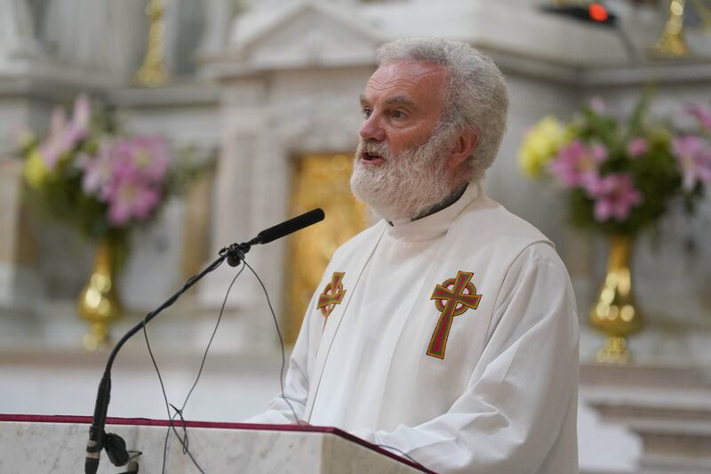 Fr Enda Brady addressing the huge crowd during a vigil in Cashel for the members of the O'Reilly family who were injured and died in a car crash on Tuesday. Photograph: Brian Lawless/PA Wire
