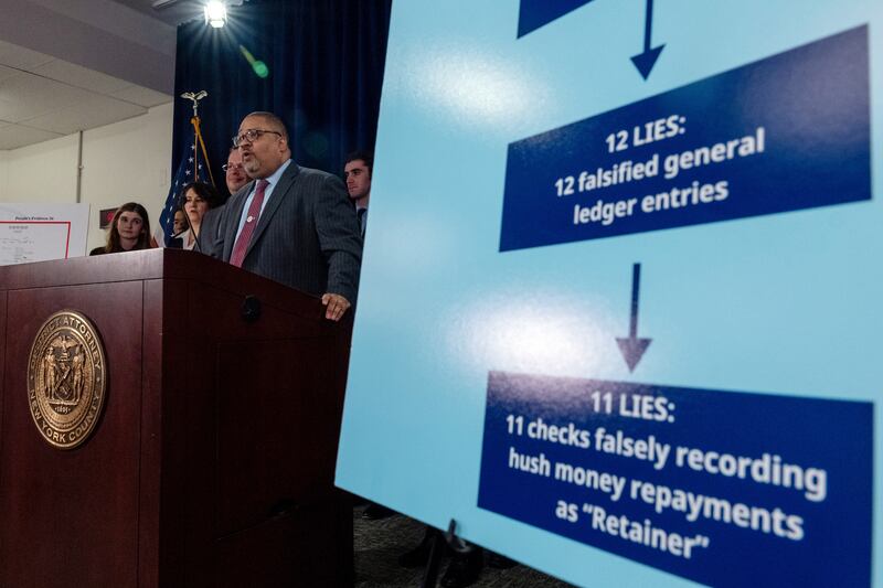 Manhattan district attorney Alvin Bragg  with members of his staff at a news conference following the conviction of Donald Trump. Photograph: Spencer Platt/Getty Images