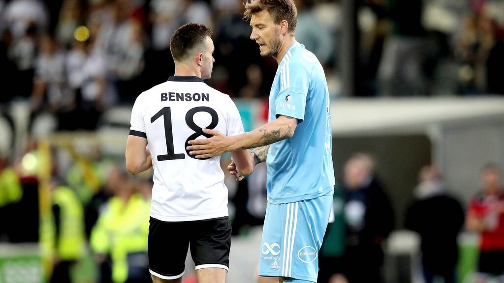 Dundalk’s Robbie Benson with Nicklas Bendtner of Rosenborg. Photograph: Inpho