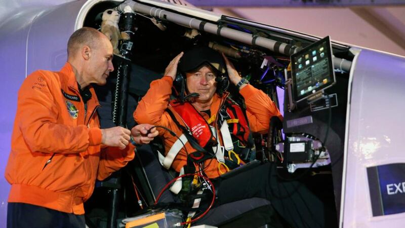 Swiss pilot Andre Borschberg (R) and his compatriot pilot Bertrand Piccard get ready to fly the Solar Impulse 2 at Al Bateen airport in Abu Dhabi March 9, 2015. Piccard and Borschberg, on Monday embarked on an attempt to fly around the world on the solar-powered airplane that is expected to last for five months and is aimed at promoting clean technology in the aviation sector. On its five-month journey of 35,000 km (22,000 miles), the engines will be powered only by solar energy. Photograph:Ahmed Jadallah/Reuters