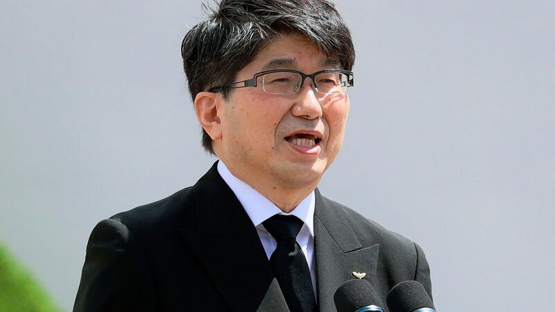 Nagasaki mayor Tomihisa Taue delivers a speech during a ceremony at Nagasaki Peace Park. Photograph: Kyodo News via AP