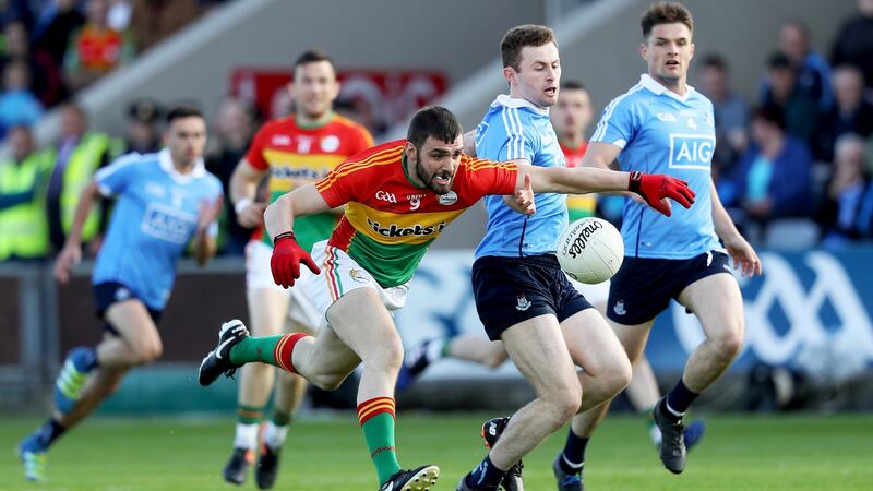 Carlow’s Sean Murphy with Jack McCaffrey of Dublin. Both men would be candidates for the title of ‘fastest man in the GAA’. Photograph: Tommy Dickson/Inpho