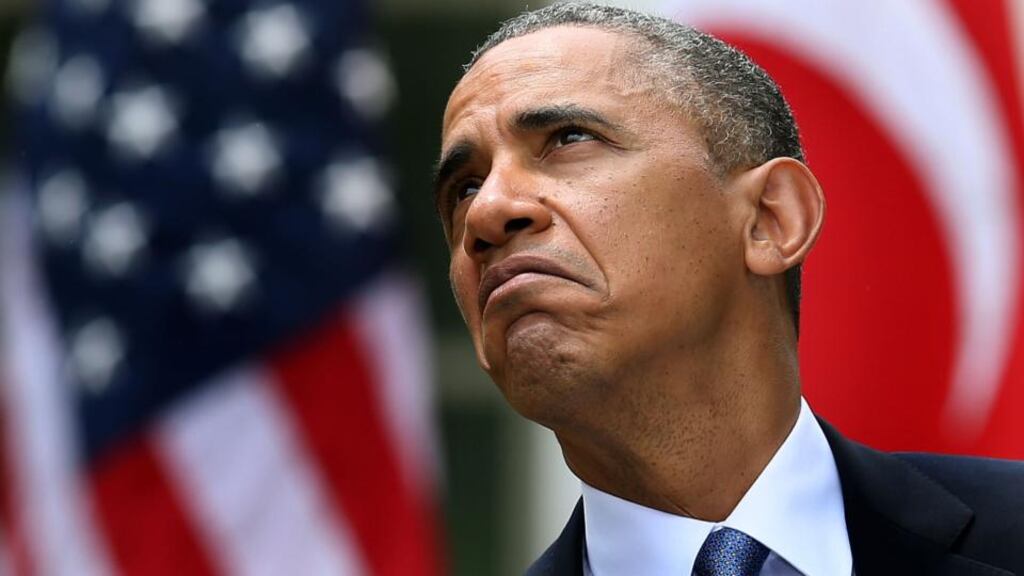 US president Barack Obama looks to see if it has stopped raining during a news conference this week with Turkish prime minister Recep Tayyip Erdogan, in the Rose Garden at the White House. Obama answered questions on the IRS Justice Department invesigation. Photograph: Mark Wilson/Getty Images