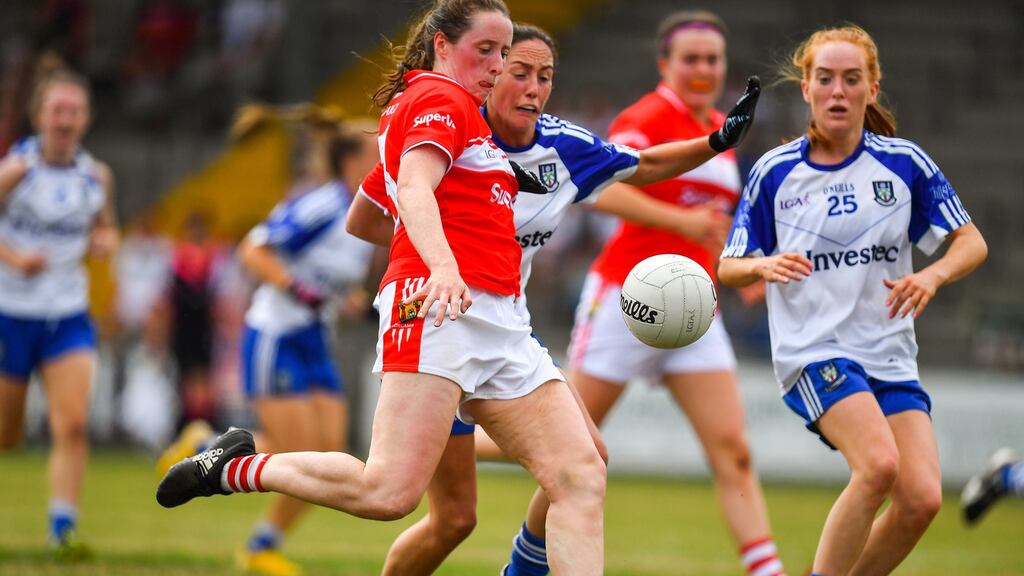 Aine O’Sullivan of Cork in action against Rachel McKenna and Gráinne McNally of Monaghan during the TG4 All-Ireland Senior Championship Group 2 Round 2 match  at St Brendan’s Park in Birr. Photograph: Brendan Moran/Sportsfile