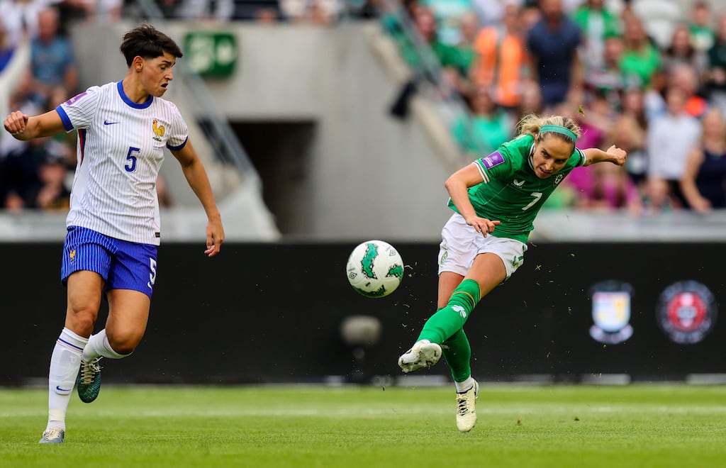 Julie-Ann Russell scores Ireland's second goal during the Euro 2025 qualifier against France at Páirc Uí Chaoimh. Photograph: Ryan Byrne/Inpho