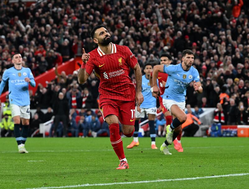 Mo Salah of Liverpool celebrates after scoring the second goal against Manchester City at Anfield. Photograph: John Powell/Liverpool FC via Getty Images