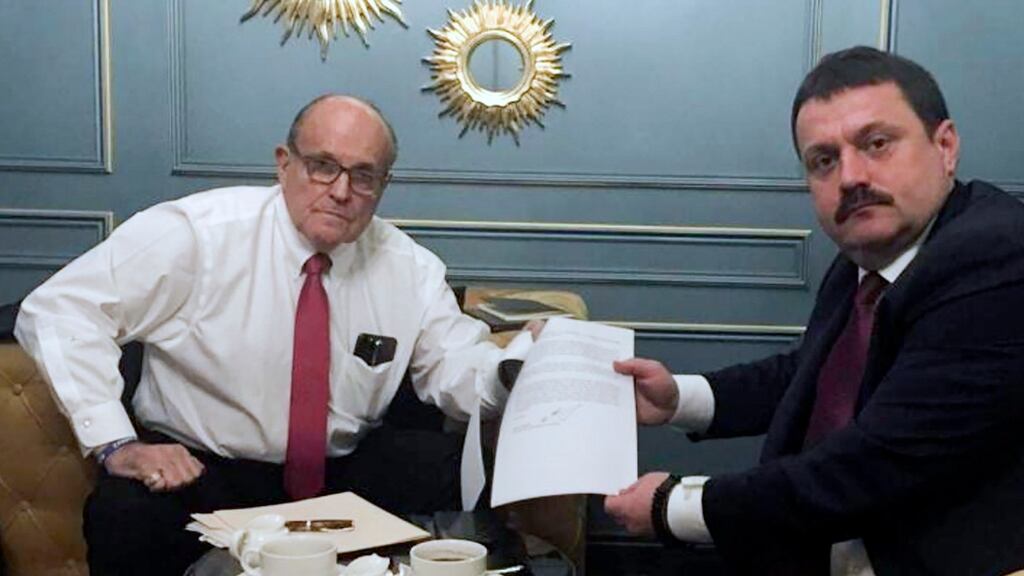Rudy Giuliani, US president Donald Trump’s personal attorney, meets with Ukrainian lawmaker Adriii Derkach in Kyiv, Ukraine, on Thursday. Photograph: Adriii Derkach’s press office via AP