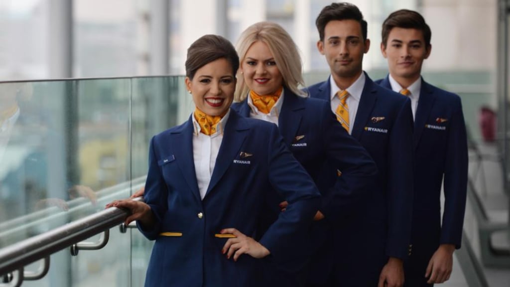 Sara Fernandes, Erin Backley, Fabio Tanzi, and Jose Calção in Ryanair’s new uniforms designed by Emma Collopy. Photograph: Sara Freund