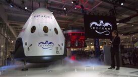 SpaceX to send first tourists around the moon next year