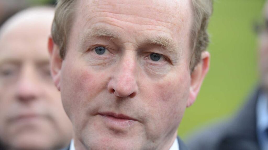 Enda Kenny said he did not accept the assertion that people would be paid for doing nothing in Irish Water.