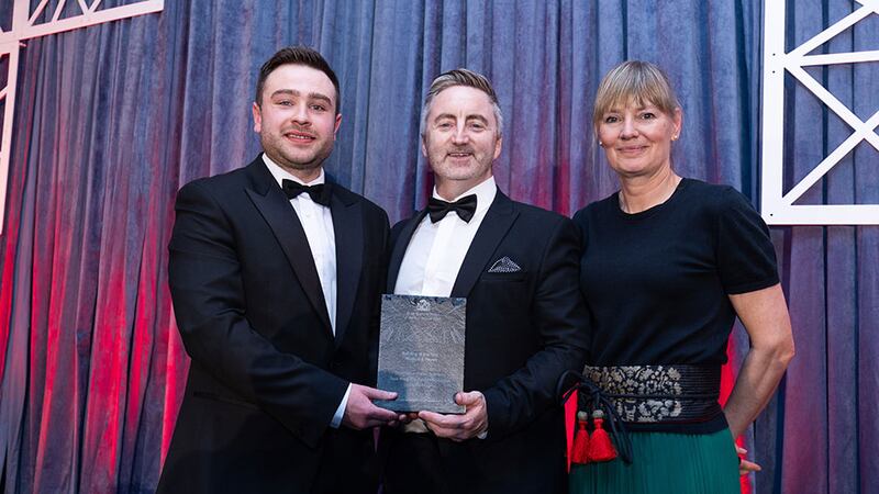 Ben Molloy, entries lead, Business River, presents the building of the year – medical & health to Paul Connolly and Deirdre Whelan, Scott Tallon Walker Architects