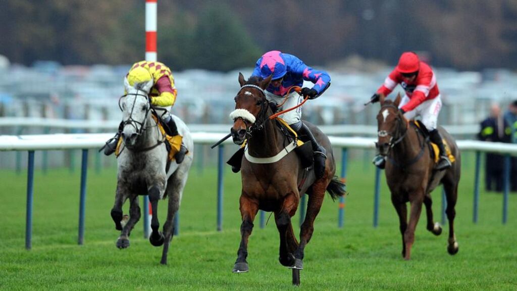 Cue Card, ridden by Joe Tizzard, lands the Betfair Chase at Haydock.