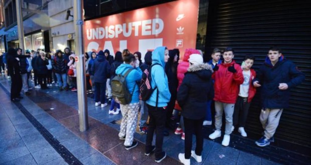 A queue outside JD Sports on Henry street during the Christmas sales. Photograph: Alan Betson / The Irish Times
