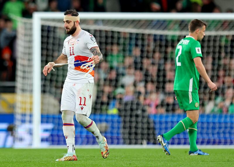 Armenia’s Tigran Barseghyan makes his way off the field after being shown a red card. Photograph: Ryan Byrne/Inpho