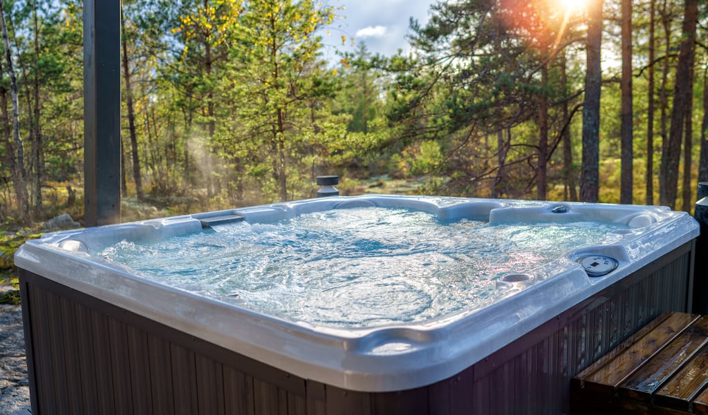 The overnight package includes a hot tub, massage and the chance to fire handguns and machine-guns. Photograph: iStock