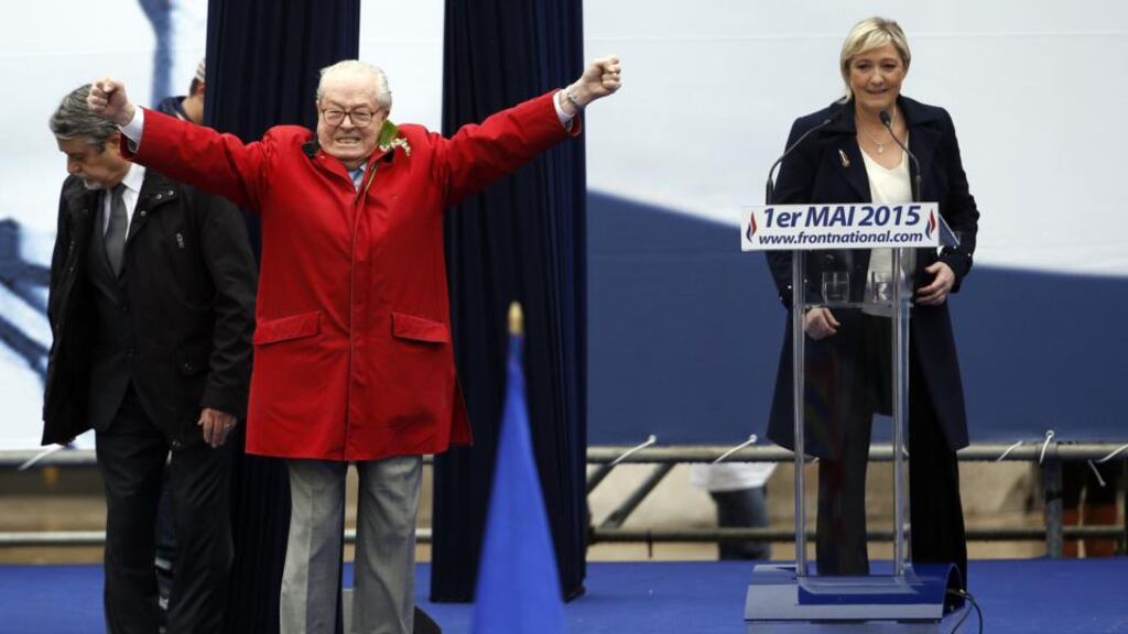 French National Front leader Marine Le Pen’s anti-EU and anti-immigration May Day rally speech in Paris was interrupted by her father, the party’s founder and honorary president Jean-Marie Le Pen. Photograph: Kenzo Tribouillard/AFP/Getty Images