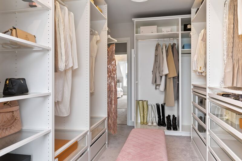 A fifth bedroom is currently used as a walk-in wardrobe.