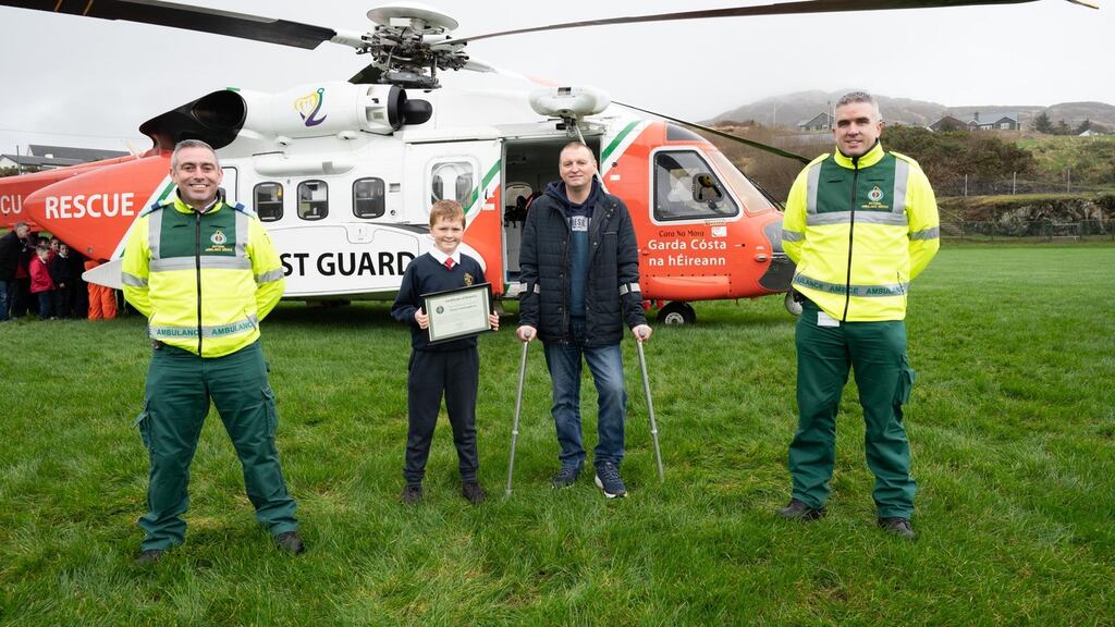 From left to right: Paramedic Cathal McGlynn, Owen Cunningham, Seamus Cunningham, and advanced paramedic Declan Murrin. Photograph: Clive Wasson