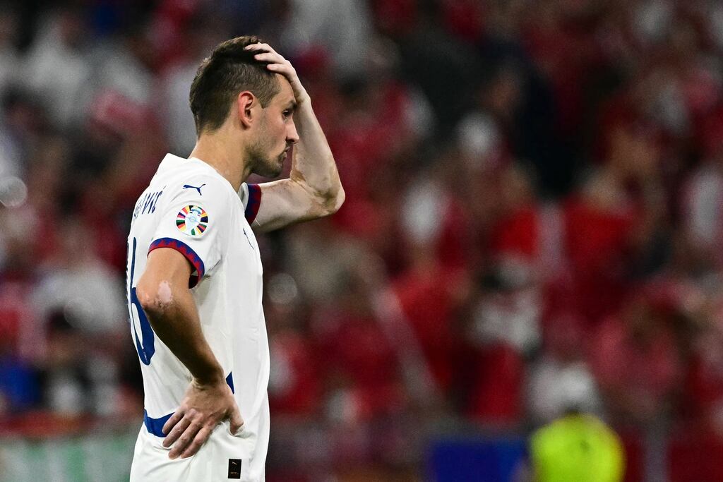 Serbia's midfielder Srdan Mijailovic reacts after a draw against Denmark. Photograph: Tobias/Schwarz/AFP via Getty Images