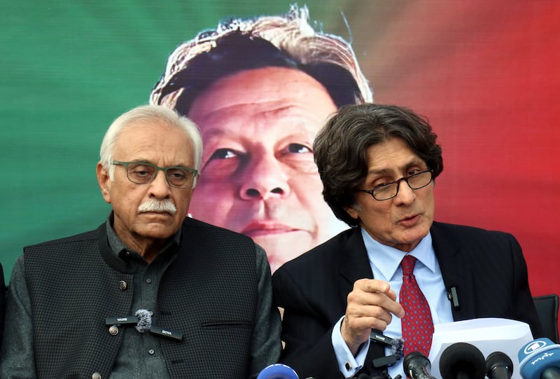 Raoof Hasan (right), the central information secretary of convicted former prime minister Imran Khan's PTI party, at a press conference in Islamabad. Photograph: Sohail Shahzad/EPA