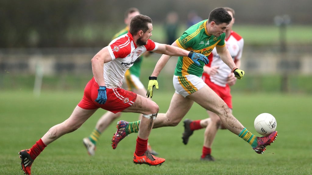 Clonmel’s Michael Quinlivan breaks past Anthony McDermott of Tir Chonaill Photograph: Andrew Fosker/Inpho