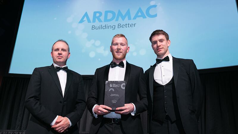 Neil Wall, Head of Entries, BusinessRiver, presents the Excellence in Health & Safety award to David Kavanagh & Peter Lonergan, Ardmac.