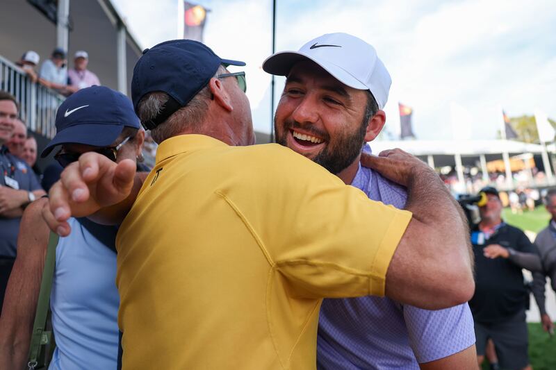 Scottie Scheffler of the US hugging his father Scott after winning the Arnold Palmer Invitational at Bay Hill golf course. Photograph: Brennan Asplen/Getty Images