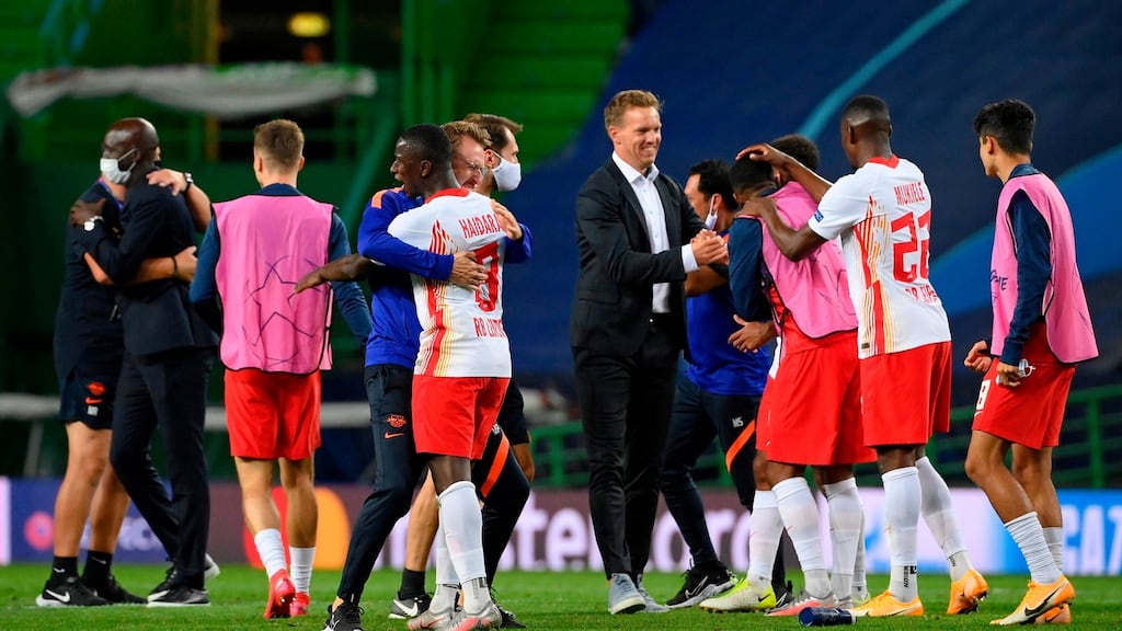 Leipzig’s young German manager Julian Nagelsmann celebrates beating Atletico Madrid at the Jose Alvalade stadium in Lisbon. Phototgraph: Getty Images