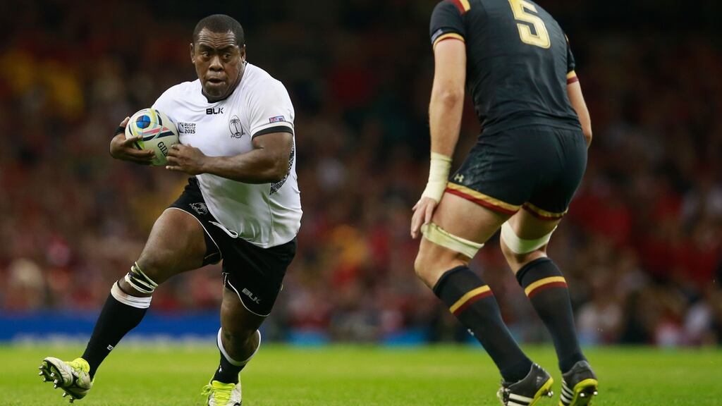 Manasa Saulo runs at Alun Wyn Jones of Wales during the 2015 Rugby World Cup Pool A match between Wales and Fiji at the Millennium Stadium. Photograph: Phil Walter/Getty Images